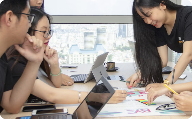 An outsourced marketing team working together